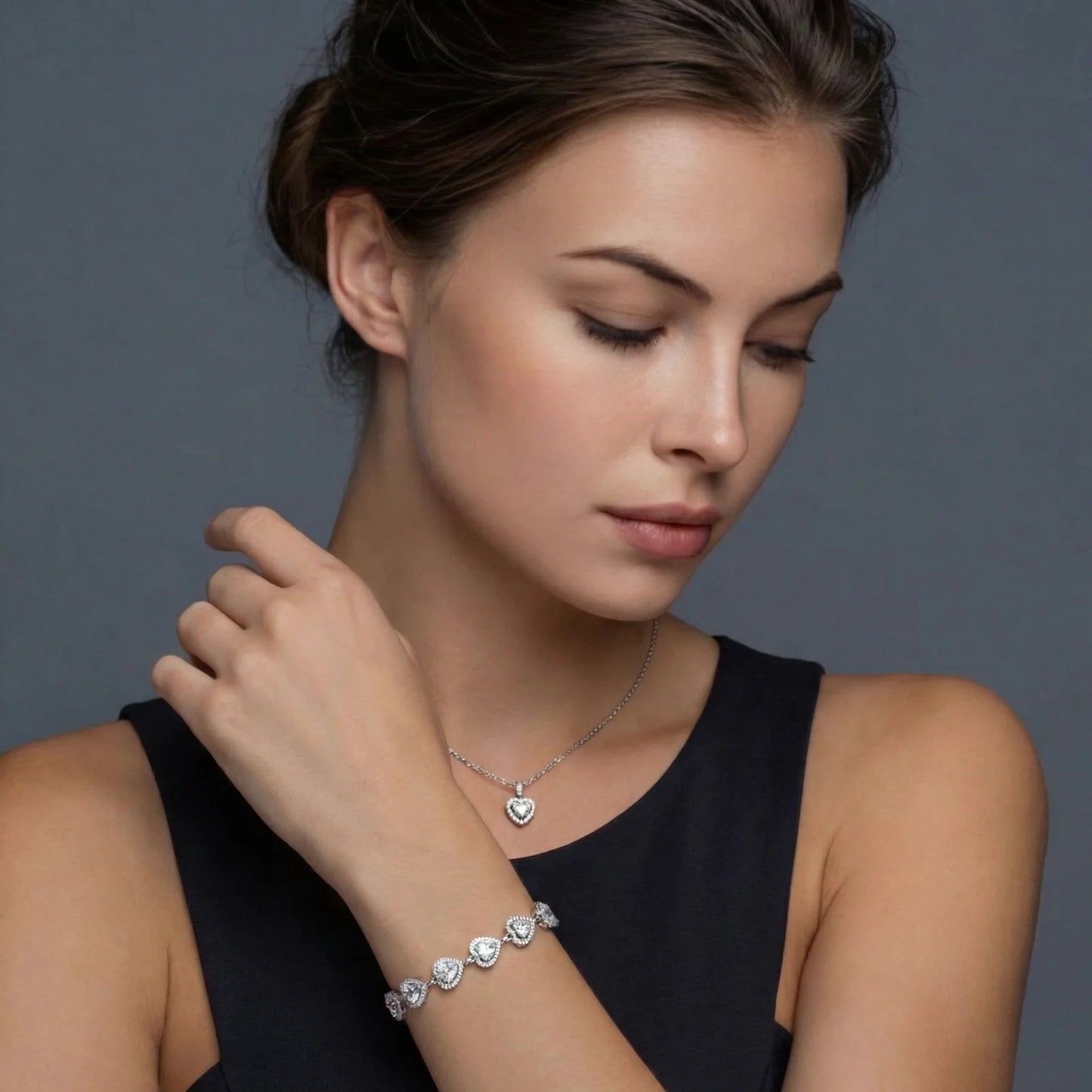 Heart shaped necklace, ring, earring and bracelet... All 4 pieces from the Jean Marie, “Heart Shaped Collection”.