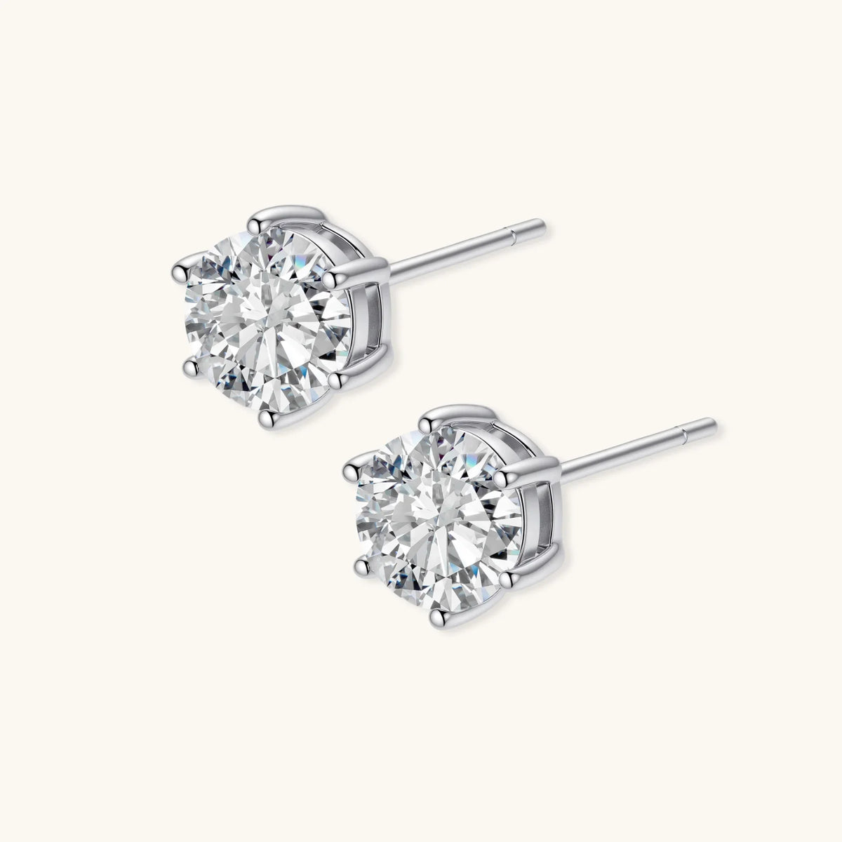 Moissanite stud earrings at an angle showing the sterling silver post and stone clarity