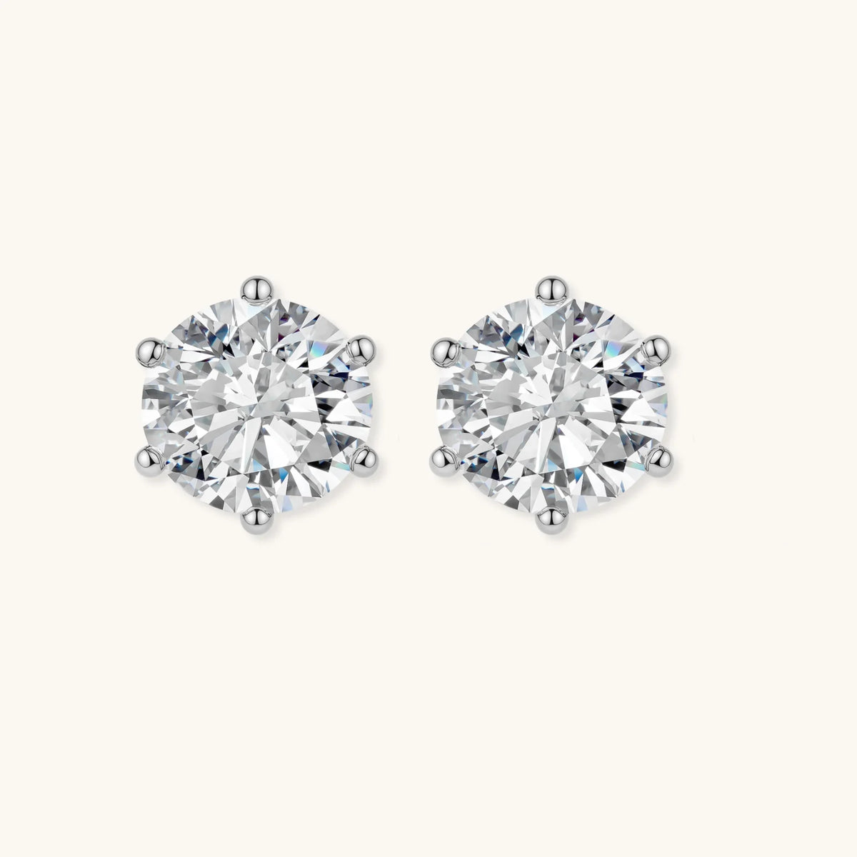 Moissanite stud earrings shown front-on, highlighting the six-prong sterling silver setting