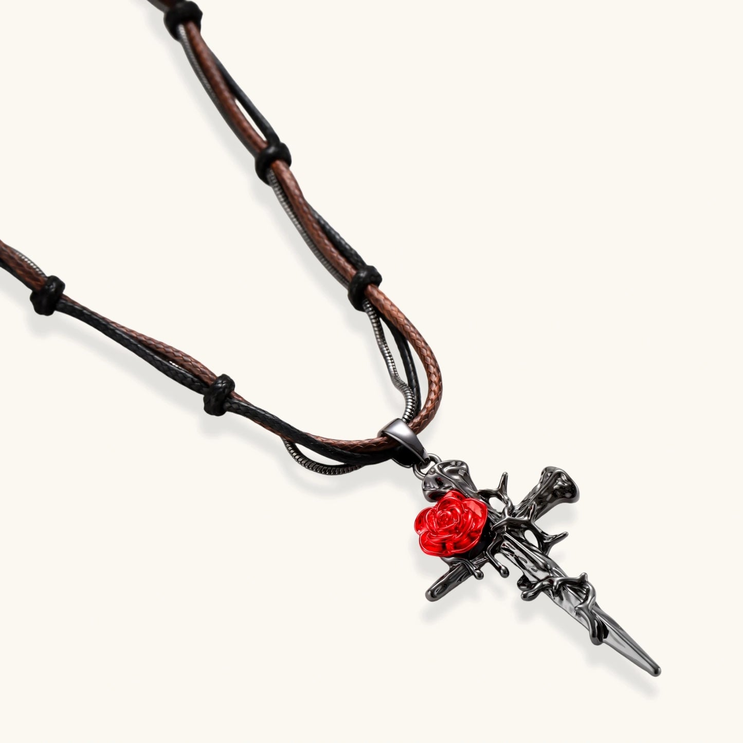 Gothic jewelry set with dark metal thorny cross pendants featuring red enamel roses and matching red crystal earrings