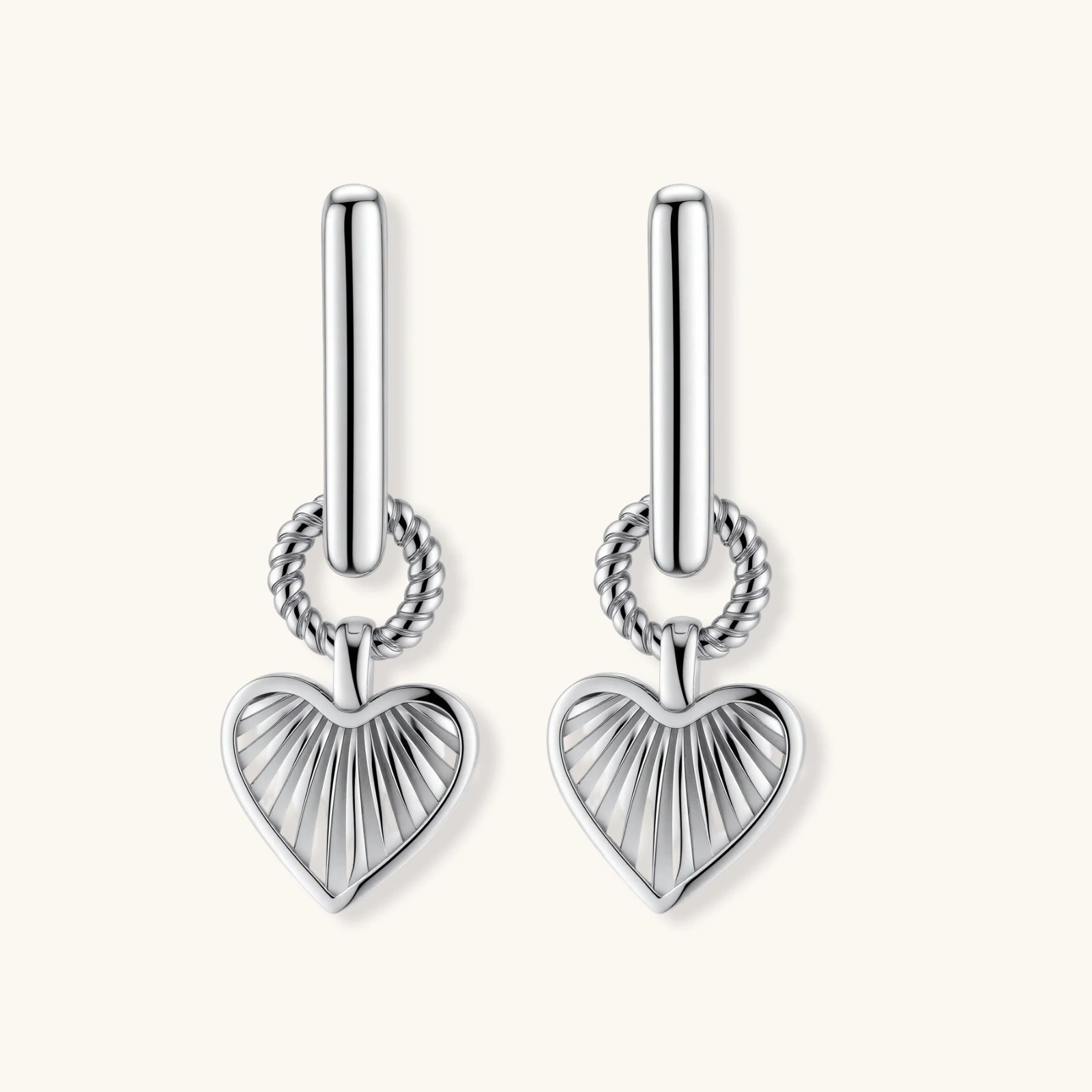 Platinum-plated 925 sterling silver rectangular hoop earrings with twisted ring connector and ribbed heart charm pendant.